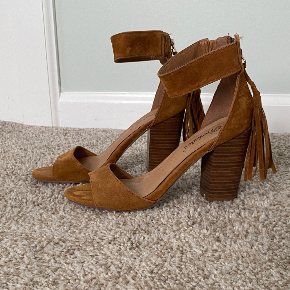 Light brown suede heels with tassels